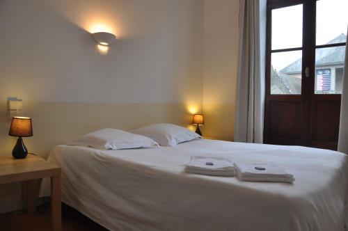 Foto de una habitación de Cafe Hotel du Theatre
