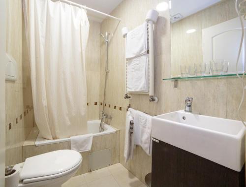 Foto de una habitación de Hostal Adria Santa Ana