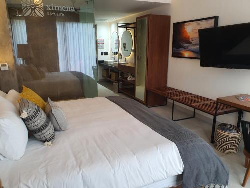 Foto de una habitación de Ximena Hotel Boutique
