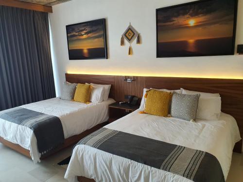 Foto de una habitación de Ximena Hotel Boutique