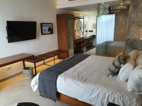 Foto de una habitación de Ximena Hotel Boutique