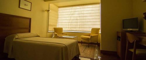Foto de una habitación de Hotel Bellavista