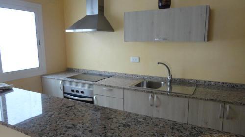 Foto de una habitación de Apartamentos Cala Llonga