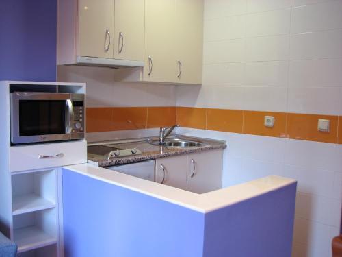 Foto de una habitación de Aparthotel Santa Marina