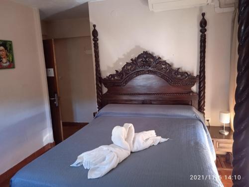 Foto de una habitación de Hostal La Palmera