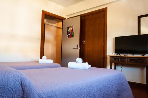 Foto de una habitación de Hostal La Palmera