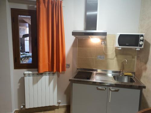 Foto de una habitación de Apartahotel La Corrala