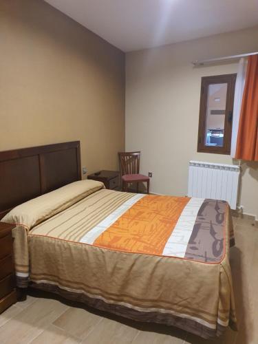 Foto de una habitación de Apartahotel La Corrala