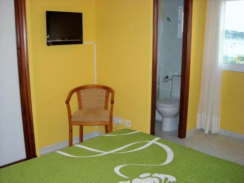 Foto de una habitación de Hostal Santa Marta Playa