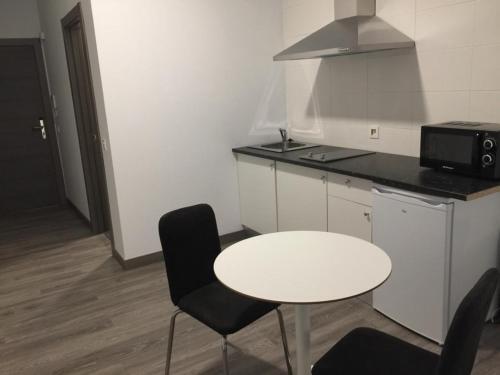 Foto de una habitación de Apartamentos Room and Kitchen Bilbao