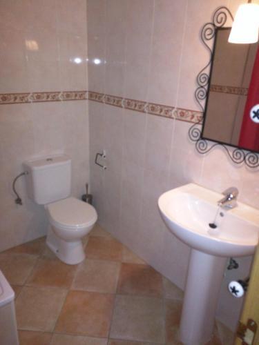 Foto de una habitación de Apartamentos San Roque 18