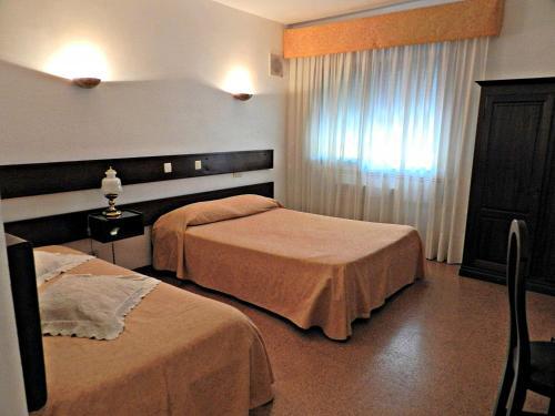 Foto de una habitación de Hotel Val Flores