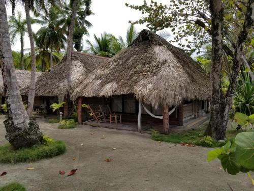 Foto de una habitación de Playa Paraiso en Magante