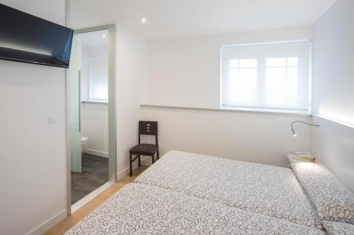 Foto de una habitación de Hotel Roma