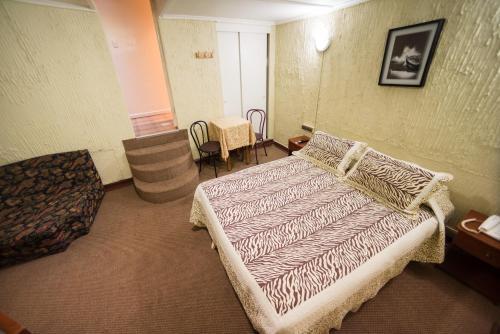 Foto de una habitación de Si Hotel
