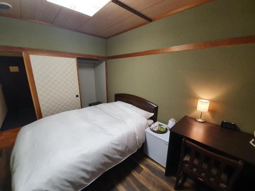Foto de una habitación de Kokoro Hotel Hakuba