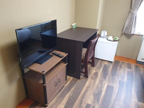 Foto de una habitación de Kokoro Hotel Hakuba