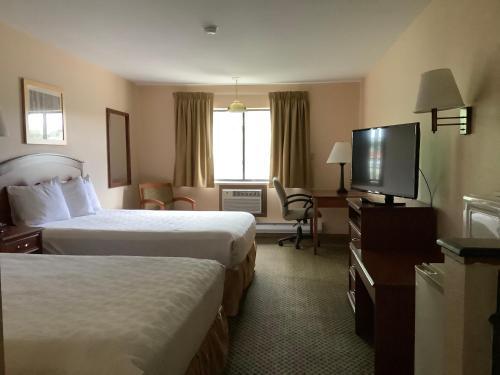 Foto de una habitación de Hotel Luxury Inn &amp;amp; Suites