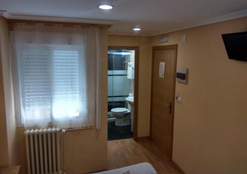 Foto de una habitación de Hostal Lido