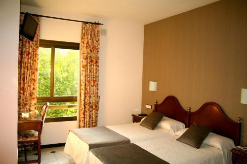 Foto de una habitación de Hotel El Cisne