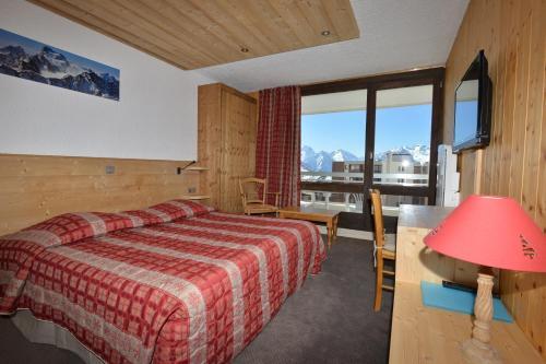 Foto de una habitación de Hotel Le Dôme