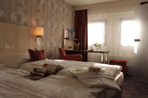Foto de una habitación de Romantisches Hotel Menzhausen