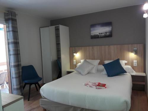 Foto de una habitación de Hotel Le Chabi