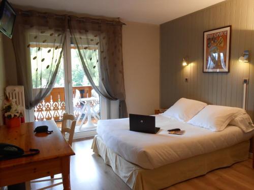 Foto de una habitación de Hotel Le Chabi