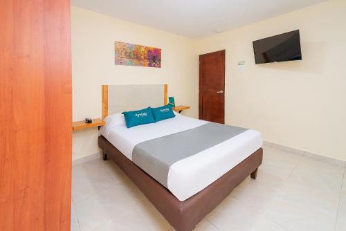 Foto de una habitación de Hotel Baly Express