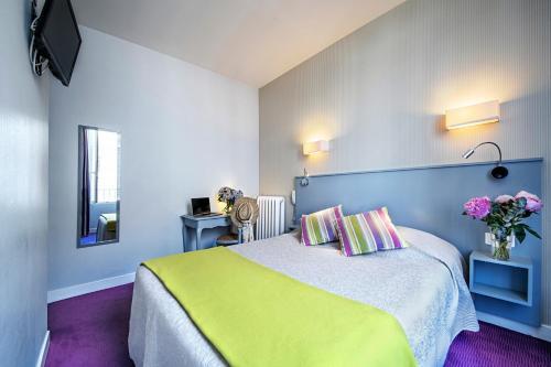 Foto de una habitación de Hôtel Le Saphir