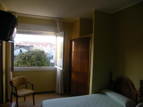 Foto de una habitación de Hotel Bayona