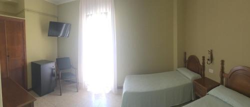 Foto de una habitación de Hotel Bayona
