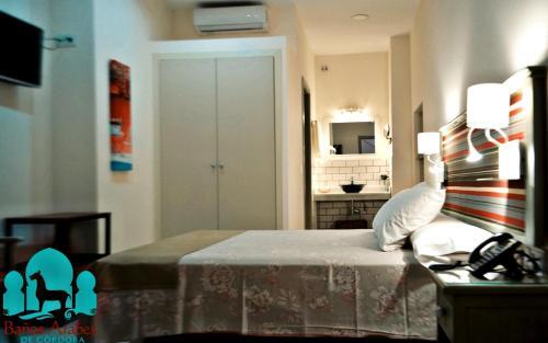 Foto de una habitación de Hotel Hospedería Baños Arabes de Córdoba Dos