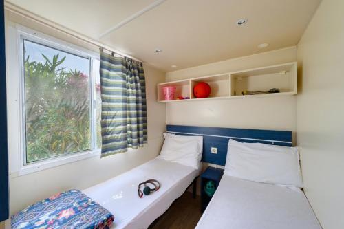 Foto de una habitación de San Benedetto Vecchio Mulino Camping Village