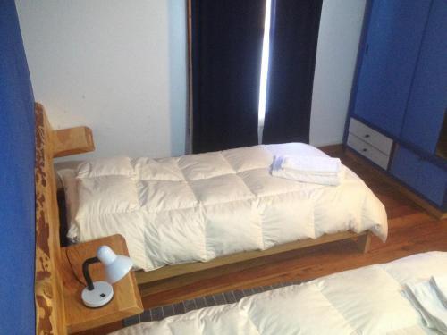 Foto de una habitación de Huala Hostel