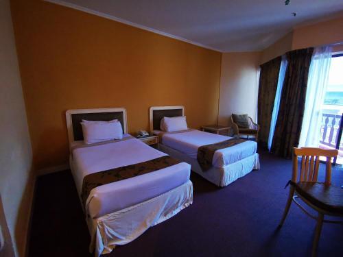 Foto de una habitación de Hotel The Grand Beach Resort Port Dickson