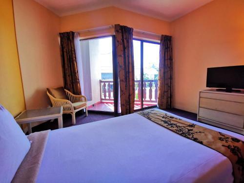 Foto de una habitación de Hotel The Grand Beach Resort Port Dickson
