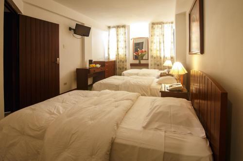 Foto de una habitación de Hotel Marcoantonio - Moyobamba