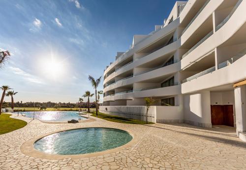 Foto de una habitación de Apartamentos Homity Exclusive Playa Granada Beach &amp;amp; Golf - Mar de Astrid