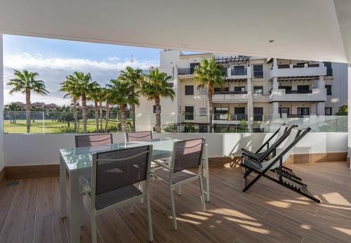 Foto de una habitación de Apartamentos Homity Exclusive Playa Granada Beach &amp;amp; Golf - Mar de Astrid