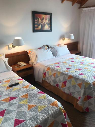 Foto de una habitación de Onais Hotel