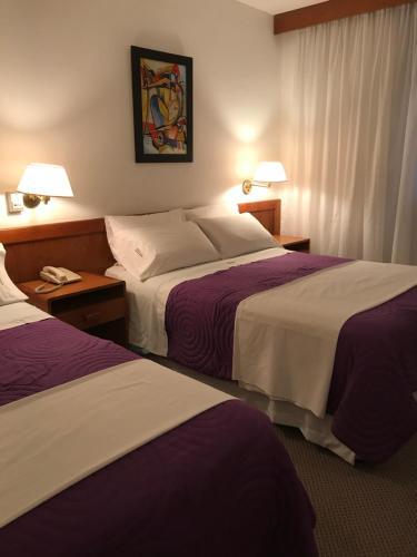 Foto de una habitación de Onais Hotel