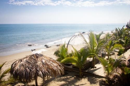 Foto de una habitación de Hoja de Palma Bungalows