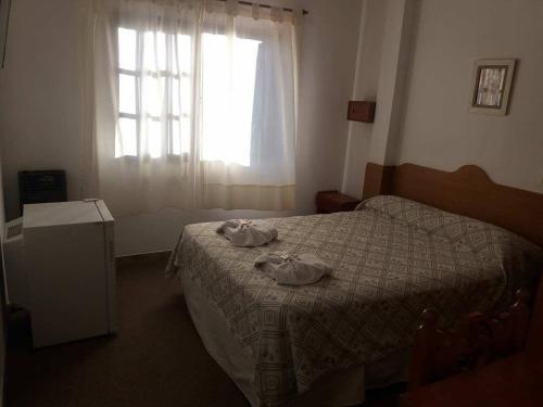 Foto de una habitación de Hotel Pinar Del Sol
