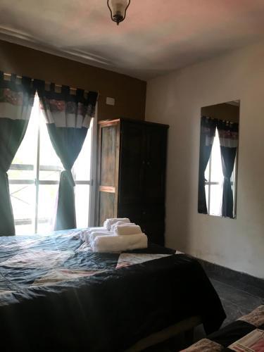 Foto de una habitación de Apartamentos Palmeras Departamentos