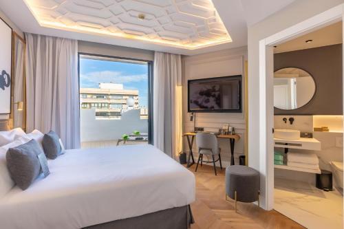 Foto de una habitación de Hotel L&amp;amp;H Gran Vía Valencia