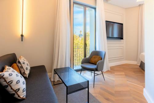 Foto de una habitación de Hotel L&amp;amp;H Gran Vía Valencia