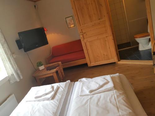 Foto de una habitación de Torsetlia Hotel