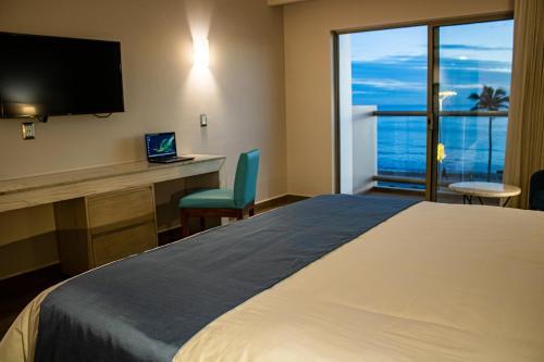 Foto de una habitación de Varali Grand Hotel