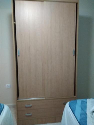 Foto de una habitación de Apartamento Turistico La Victoria